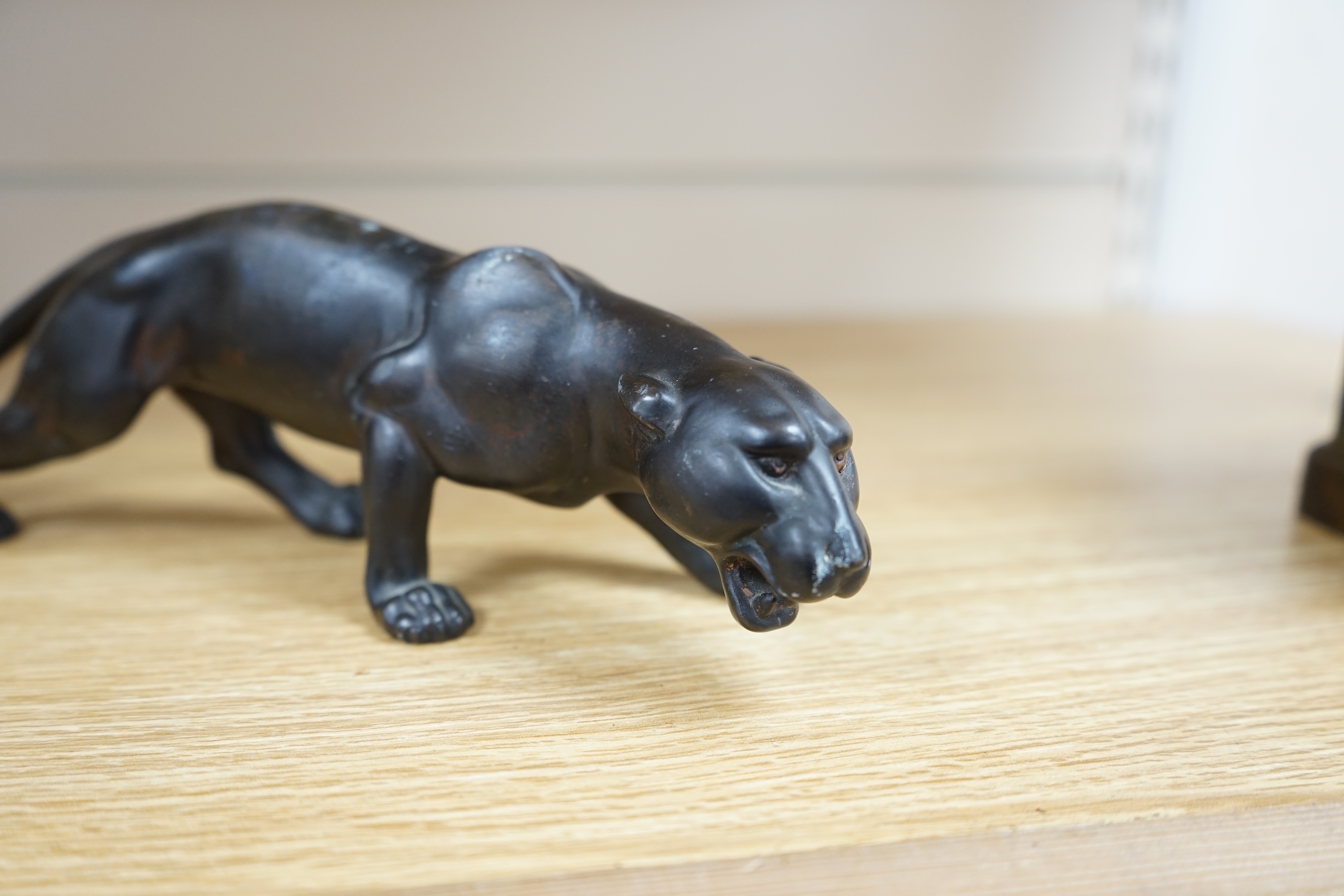 A small bronzed model of a Panther, 25cm long. Condition - some slight scuffing to surface